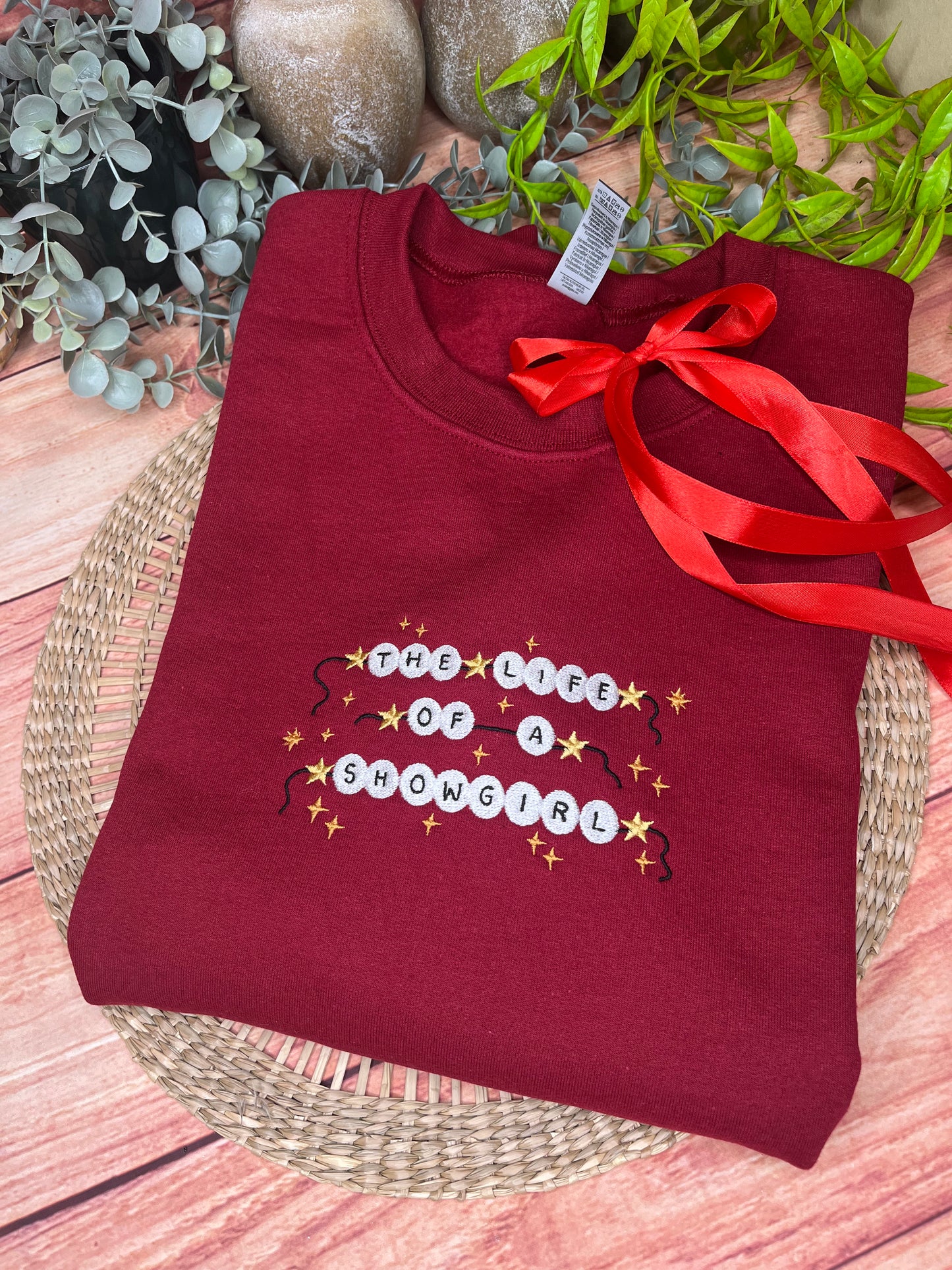 THE LIFE OF A SHOWGIRL EMBROIDERED SWEATSHIRT