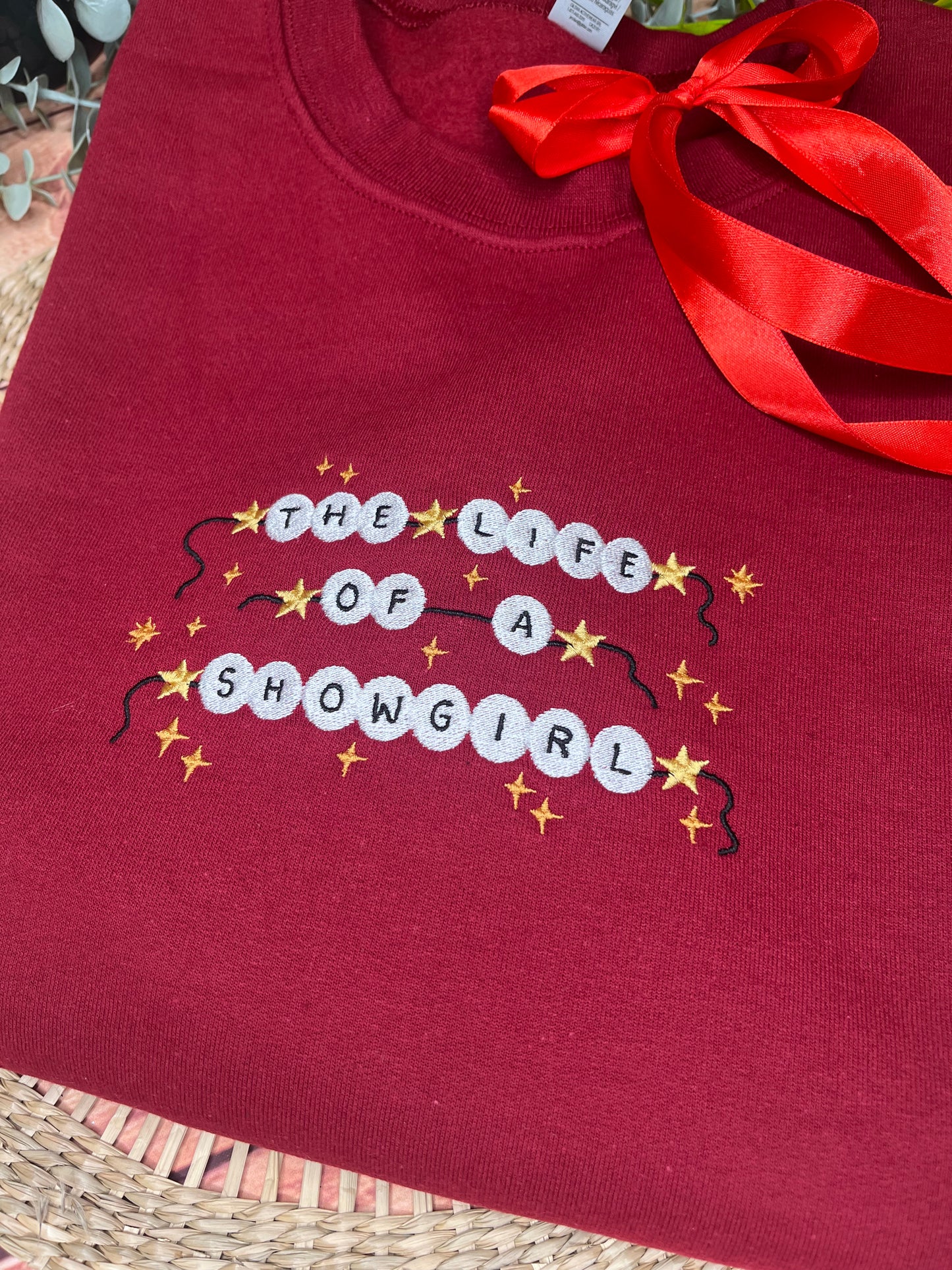 THE LIFE OF A SHOWGIRL EMBROIDERED SWEATSHIRT