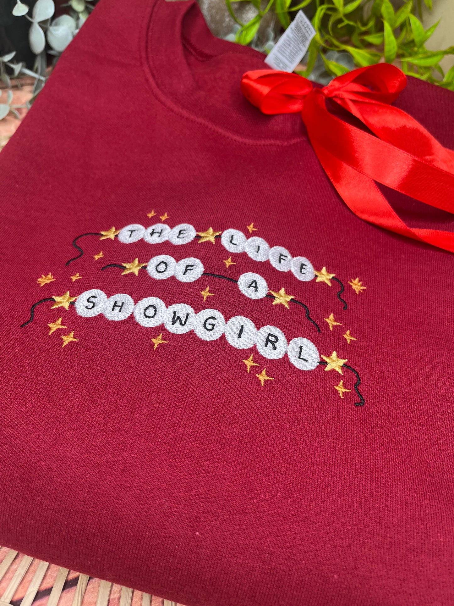 THE LIFE OF A SHOWGIRL EMBROIDERED SWEATSHIRT