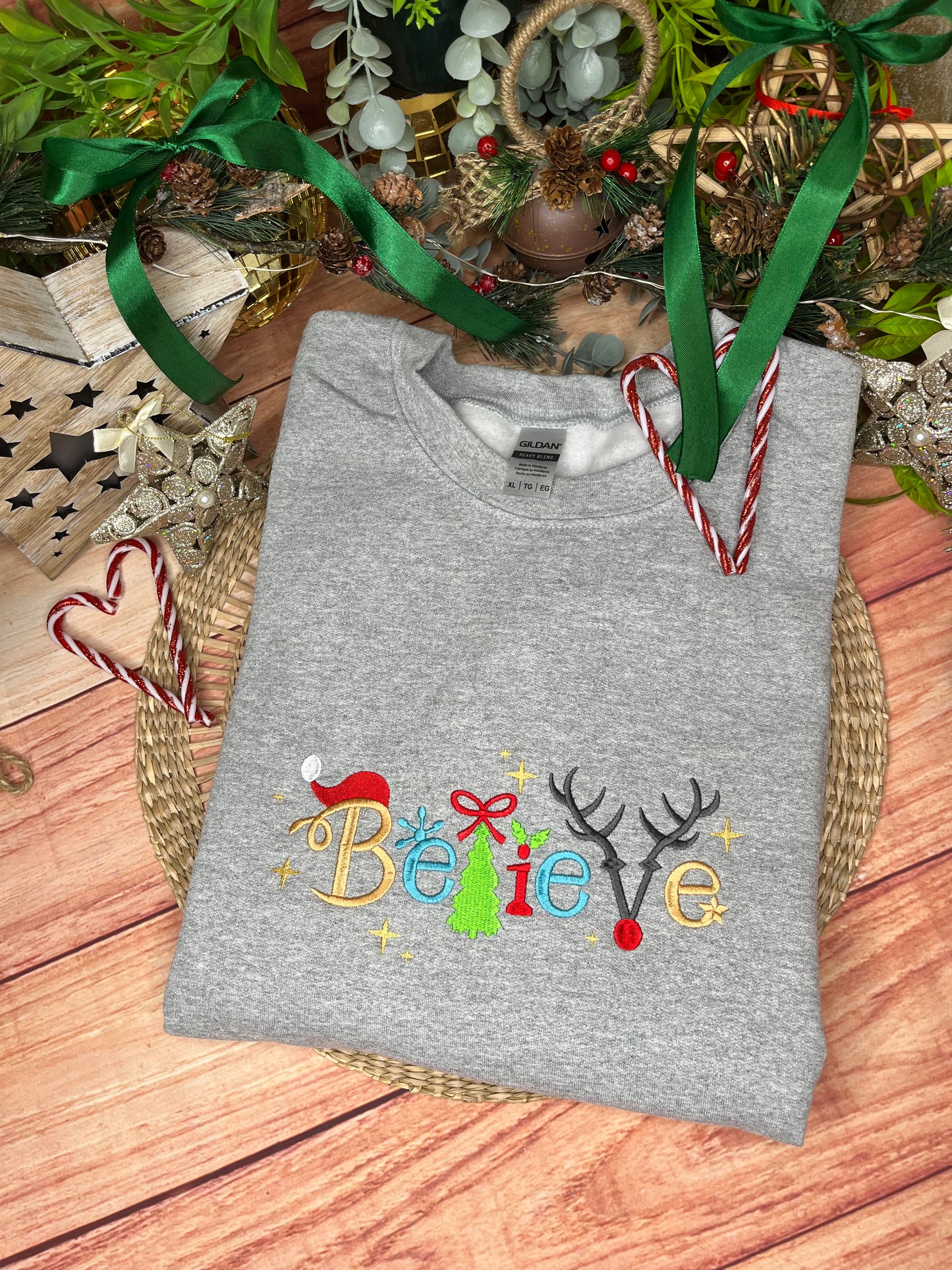 BELIEVE CHRISTMAS EMBROIDERED SWEATSHIRT