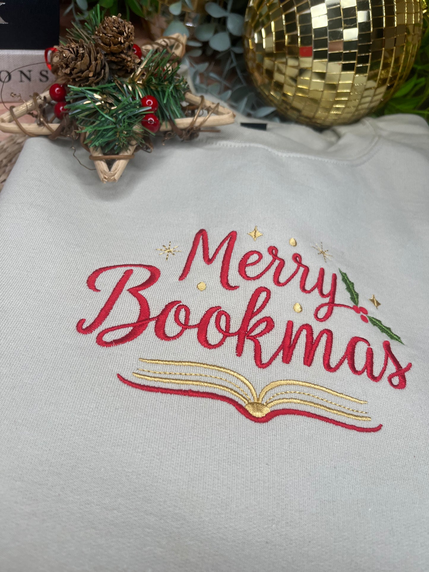 MERRY BOOKMAS EMBROIDERED SWEATSHIRT