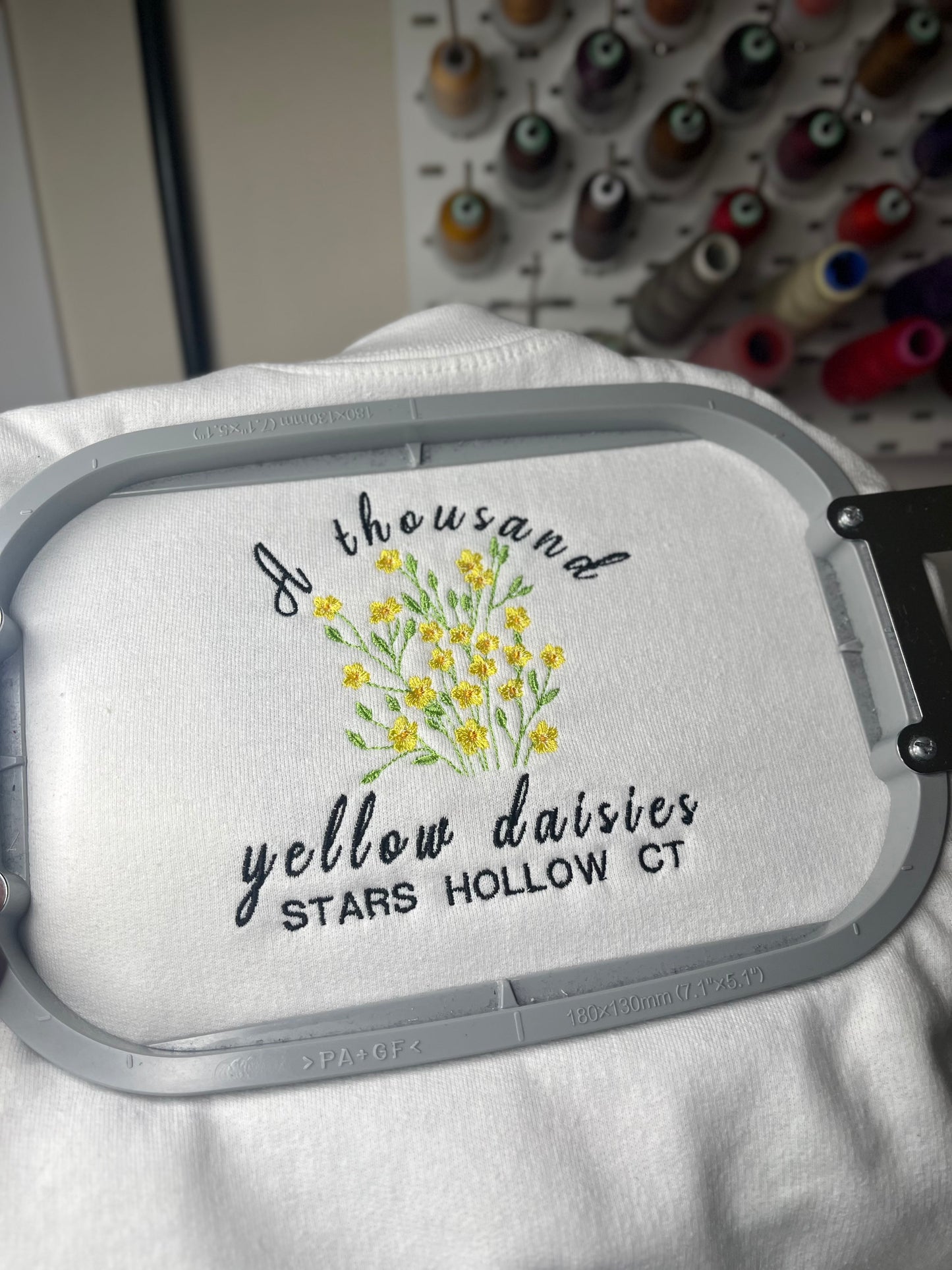 A THOUSAND YELLOW DAISIES EMBROIDERED SWEATSHIRT