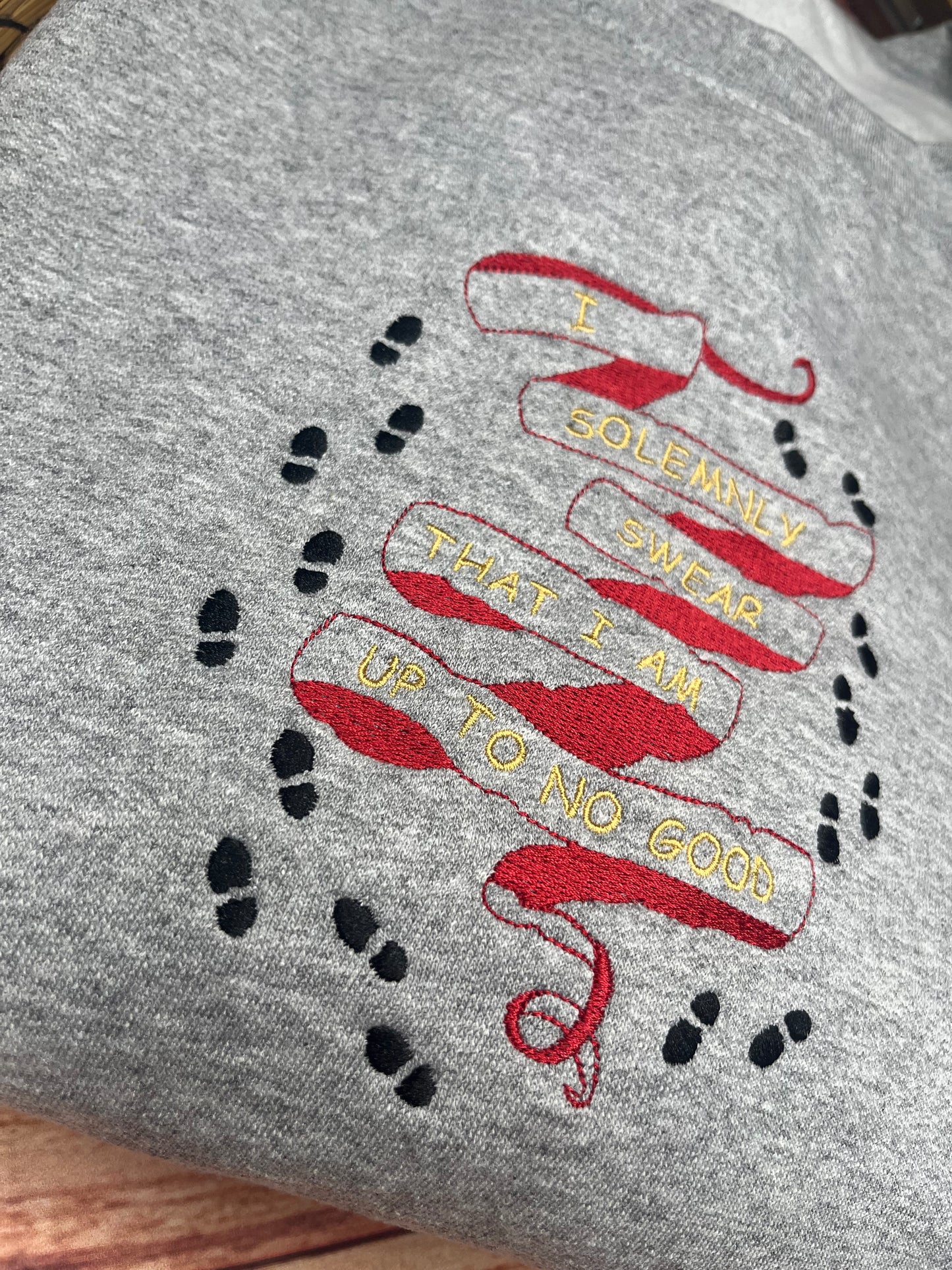 I SOLEMNLY SWEAR THAT I AM UP TO NO GOOD WITH FOOTPRINTS SWEATSHIRT