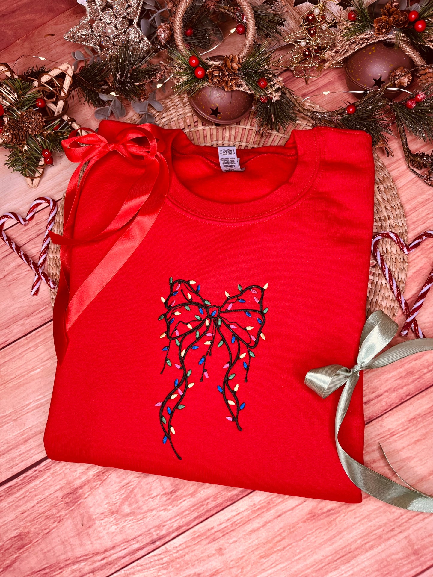 FESTIVE BOW WITH LIGHTS EMBROIDERED SWEATSHIRT