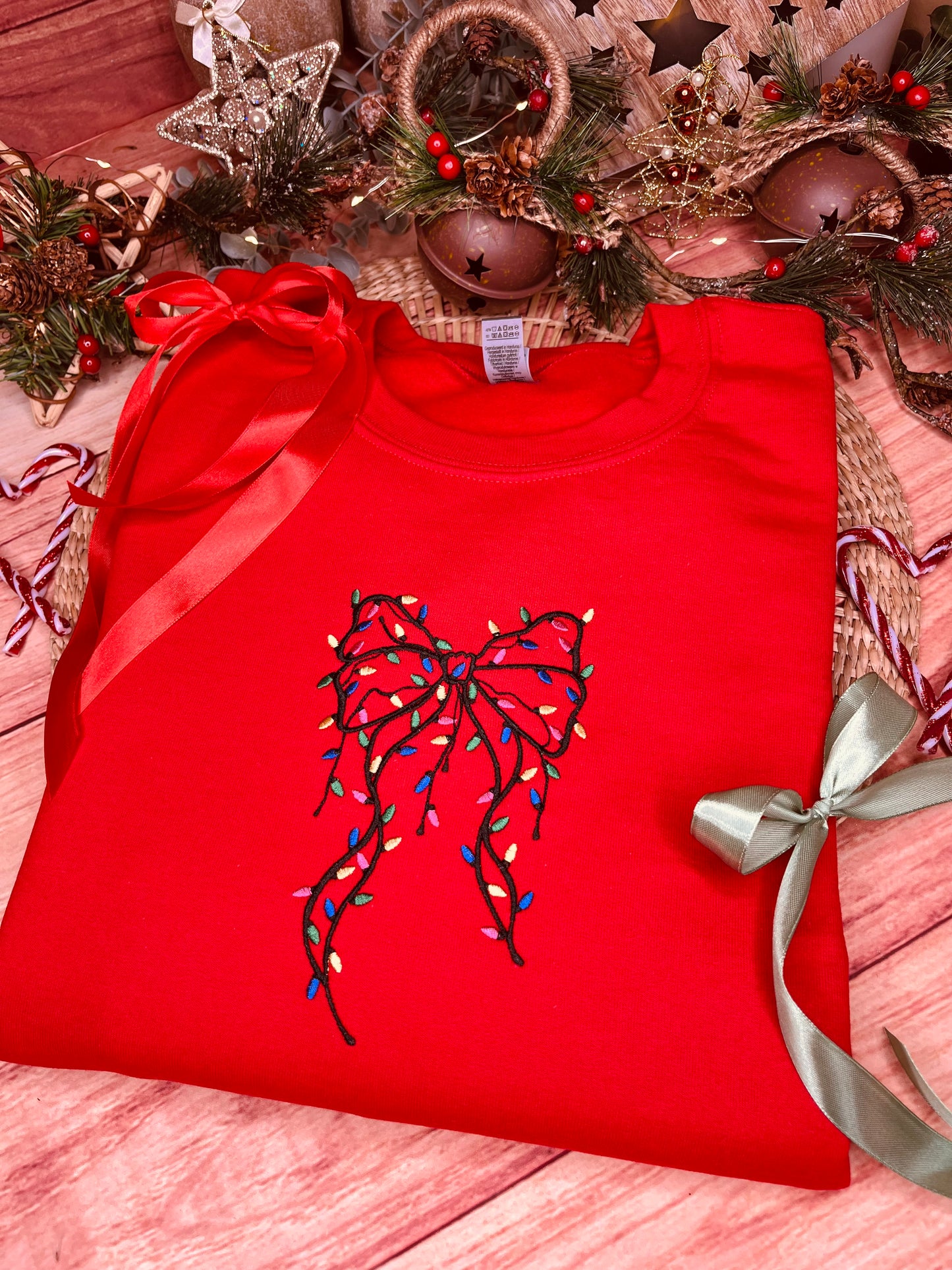 FESTIVE BOW WITH LIGHTS EMBROIDERED SWEATSHIRT