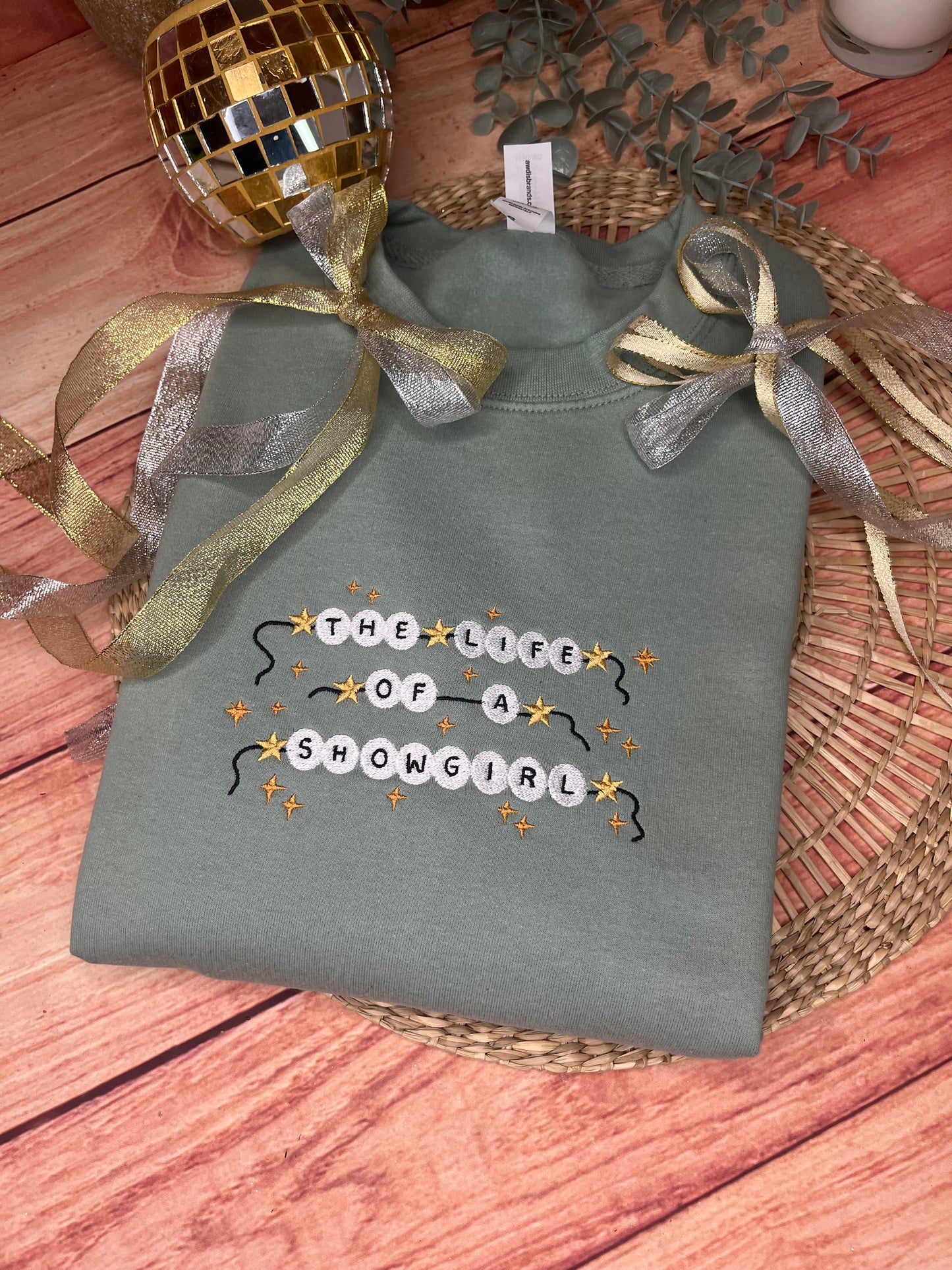 THE LIFE OF A SHOWGIRL EMBROIDERED SWEATSHIRT