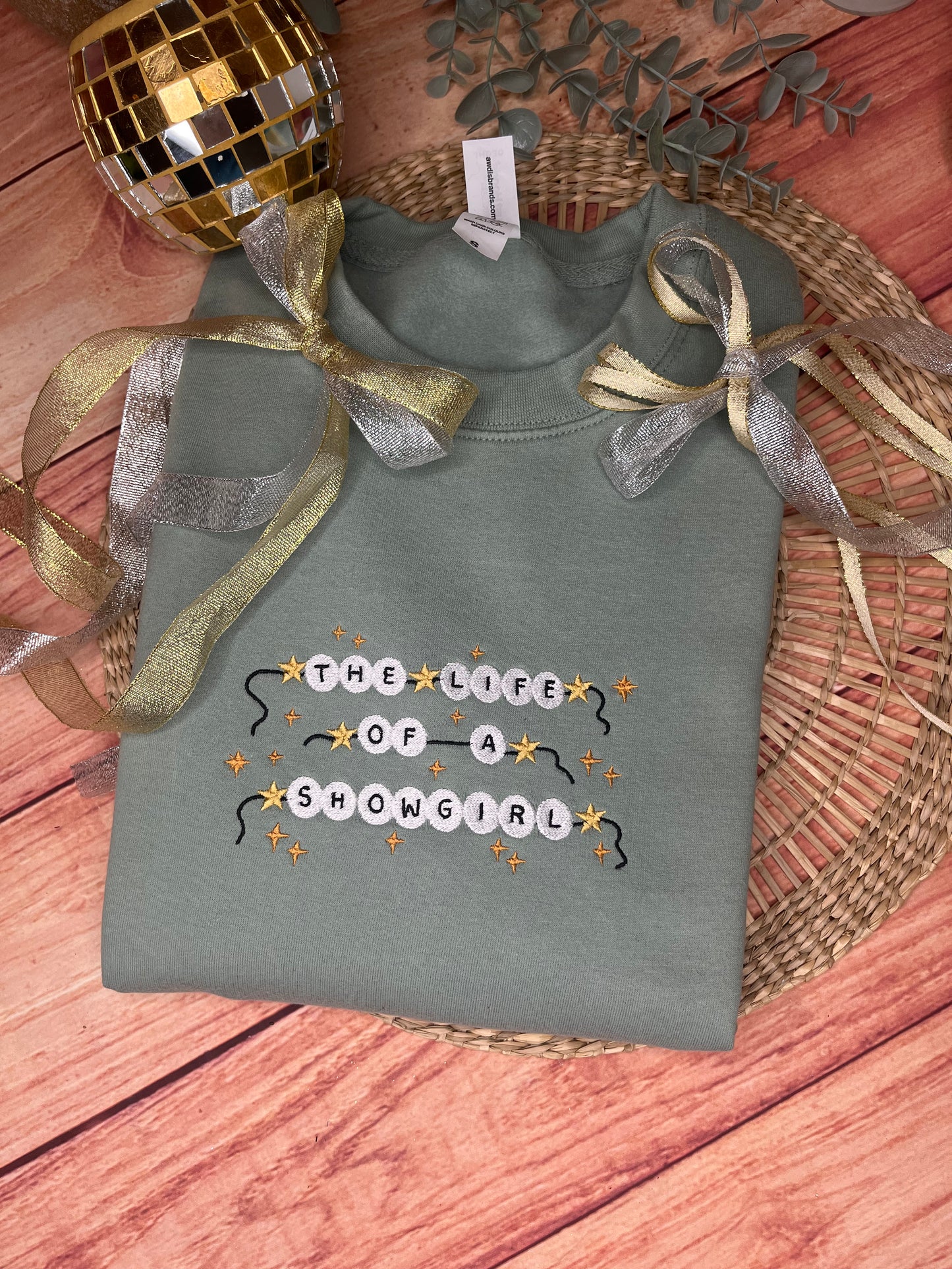THE LIFE OF A SHOWGIRL EMBROIDERED SWEATSHIRT