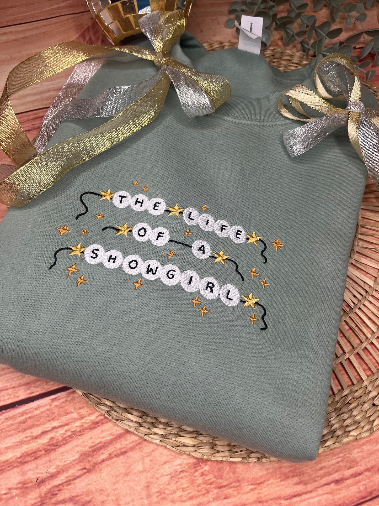 THE LIFE OF A SHOWGIRL EMBROIDERED SWEATSHIRT