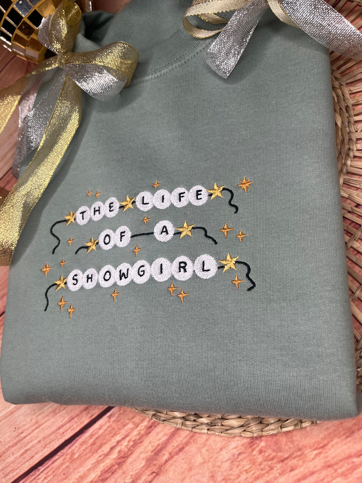 THE LIFE OF A SHOWGIRL EMBROIDERED SWEATSHIRT