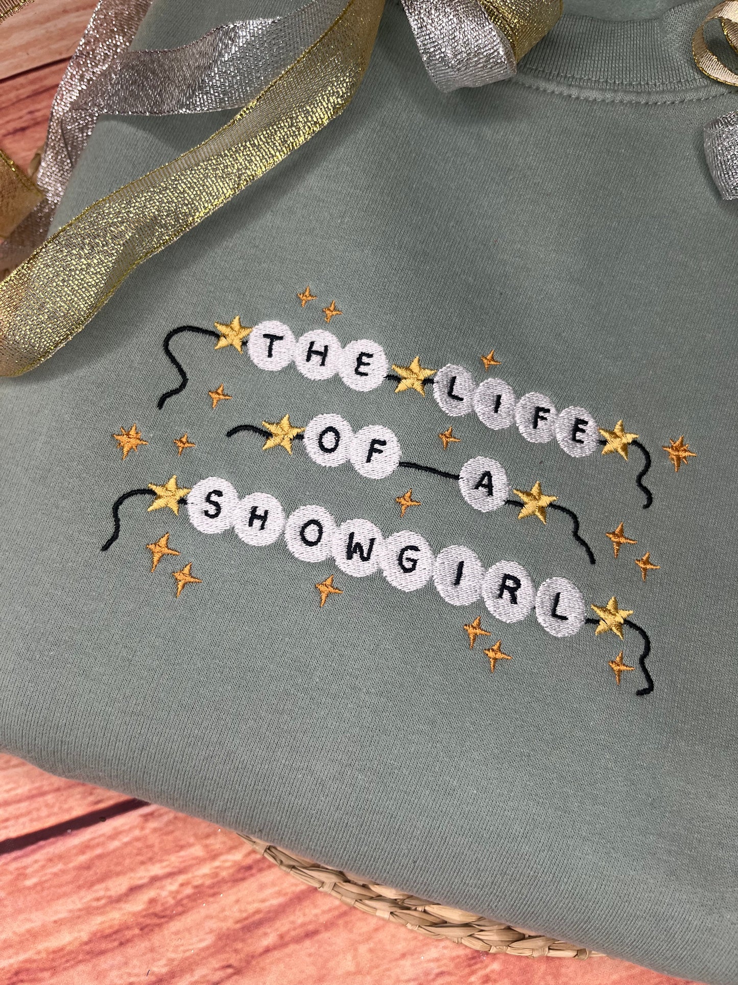THE LIFE OF A SHOWGIRL EMBROIDERED SWEATSHIRT