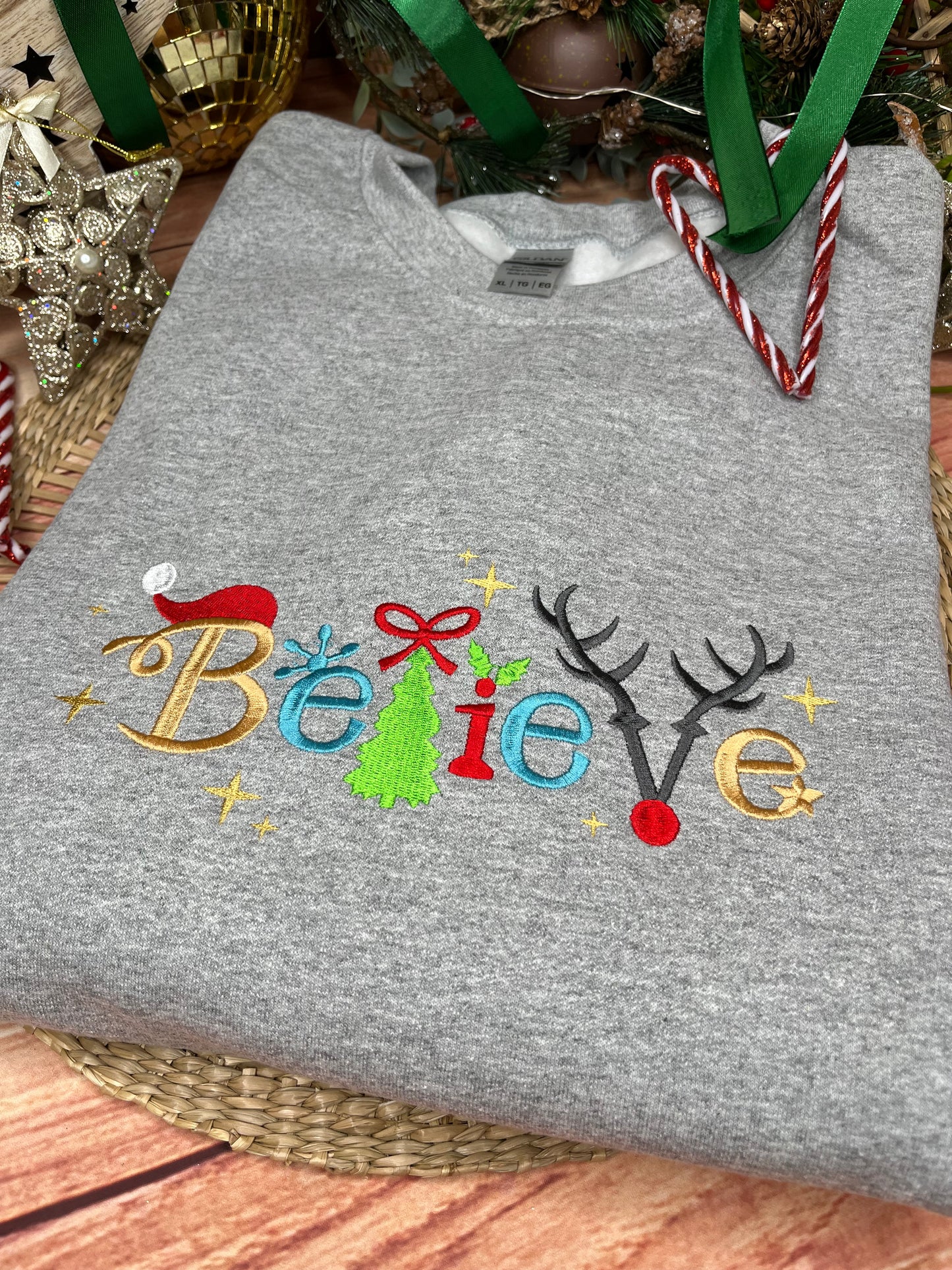 BELIEVE CHRISTMAS EMBROIDERED SWEATSHIRT