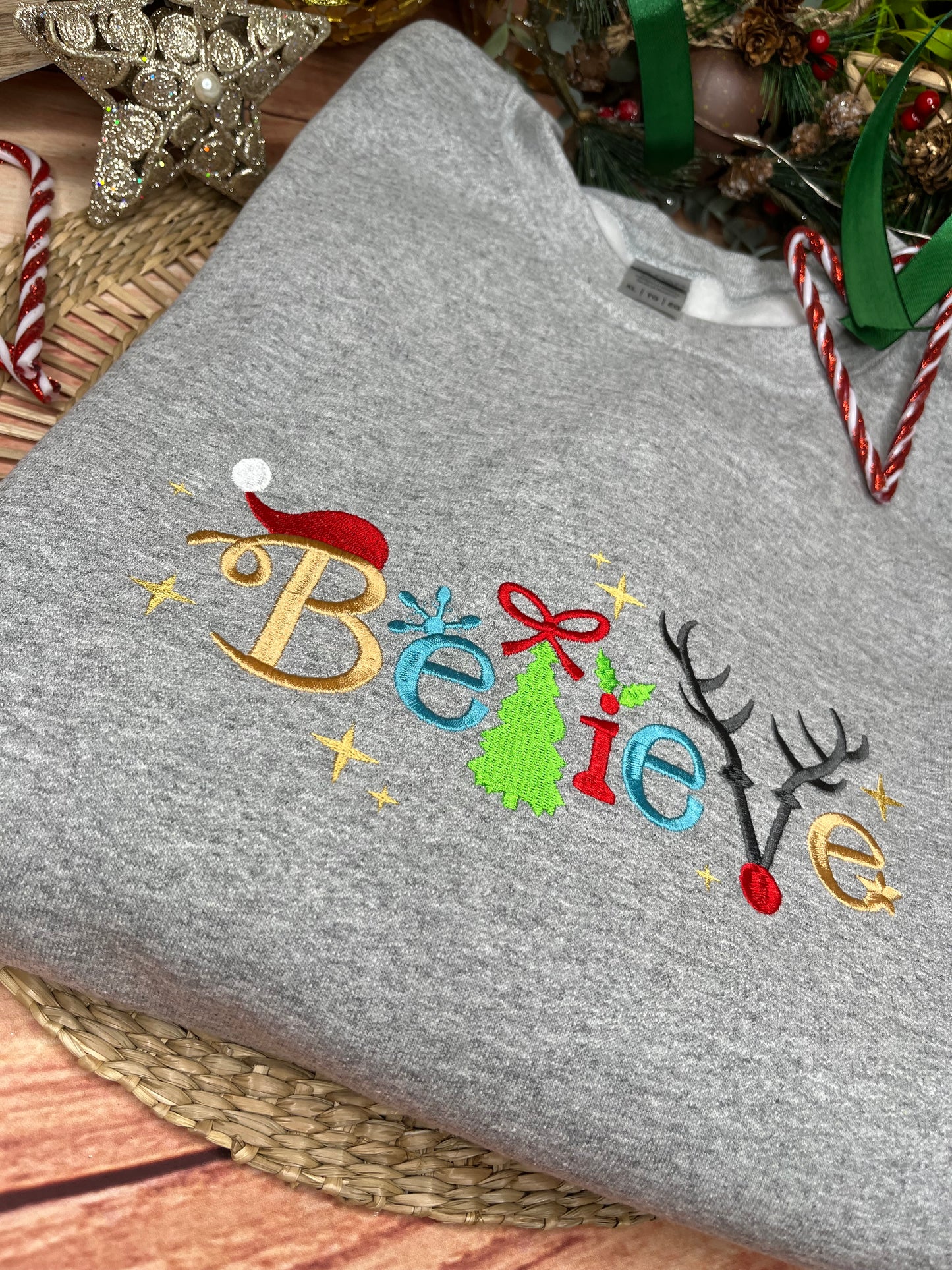 BELIEVE CHRISTMAS EMBROIDERED SWEATSHIRT