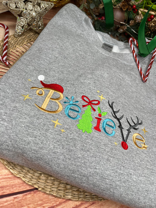 BELIEVE CHRISTMAS EMBROIDERED SWEATSHIRT