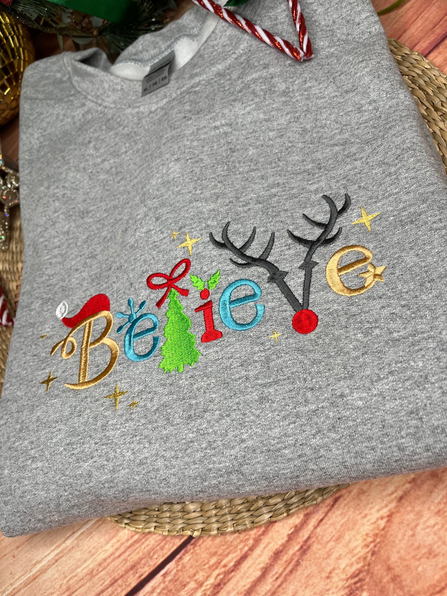 BELIEVE CHRISTMAS EMBROIDERED SWEATSHIRT