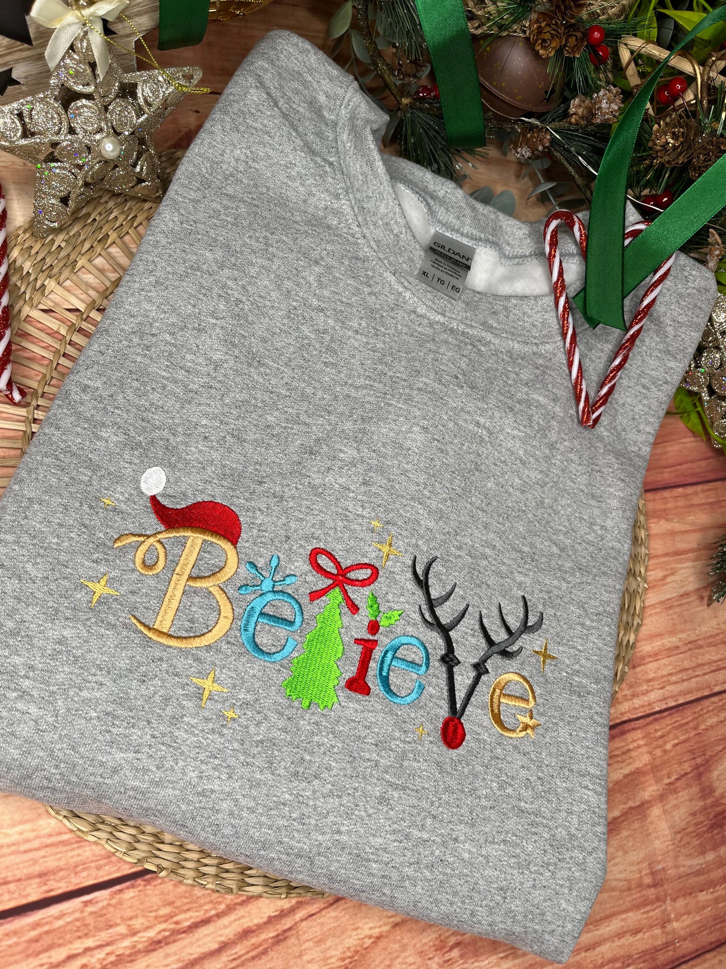 BELIEVE CHRISTMAS EMBROIDERED SWEATSHIRT