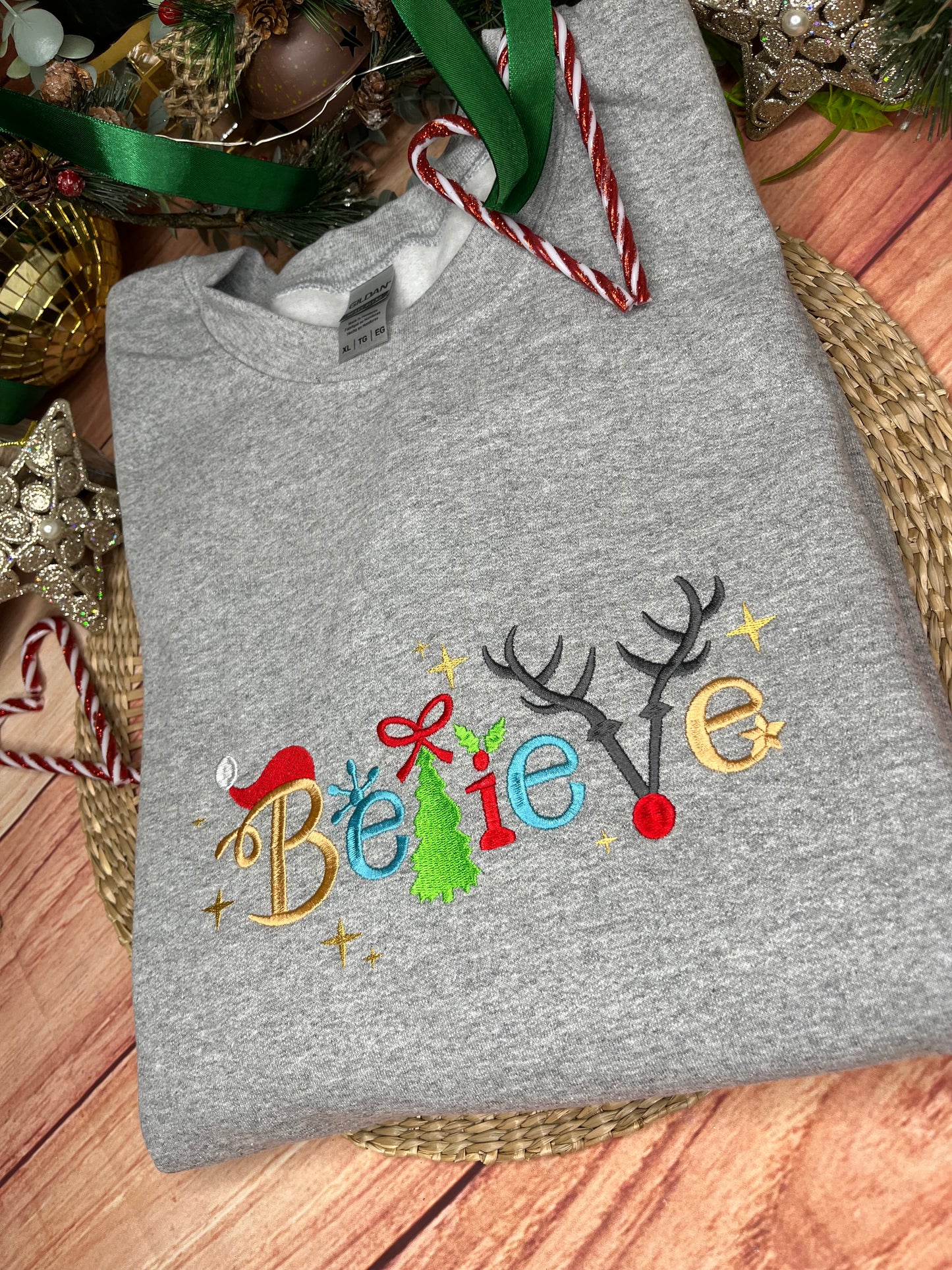 BELIEVE CHRISTMAS EMBROIDERED SWEATSHIRT