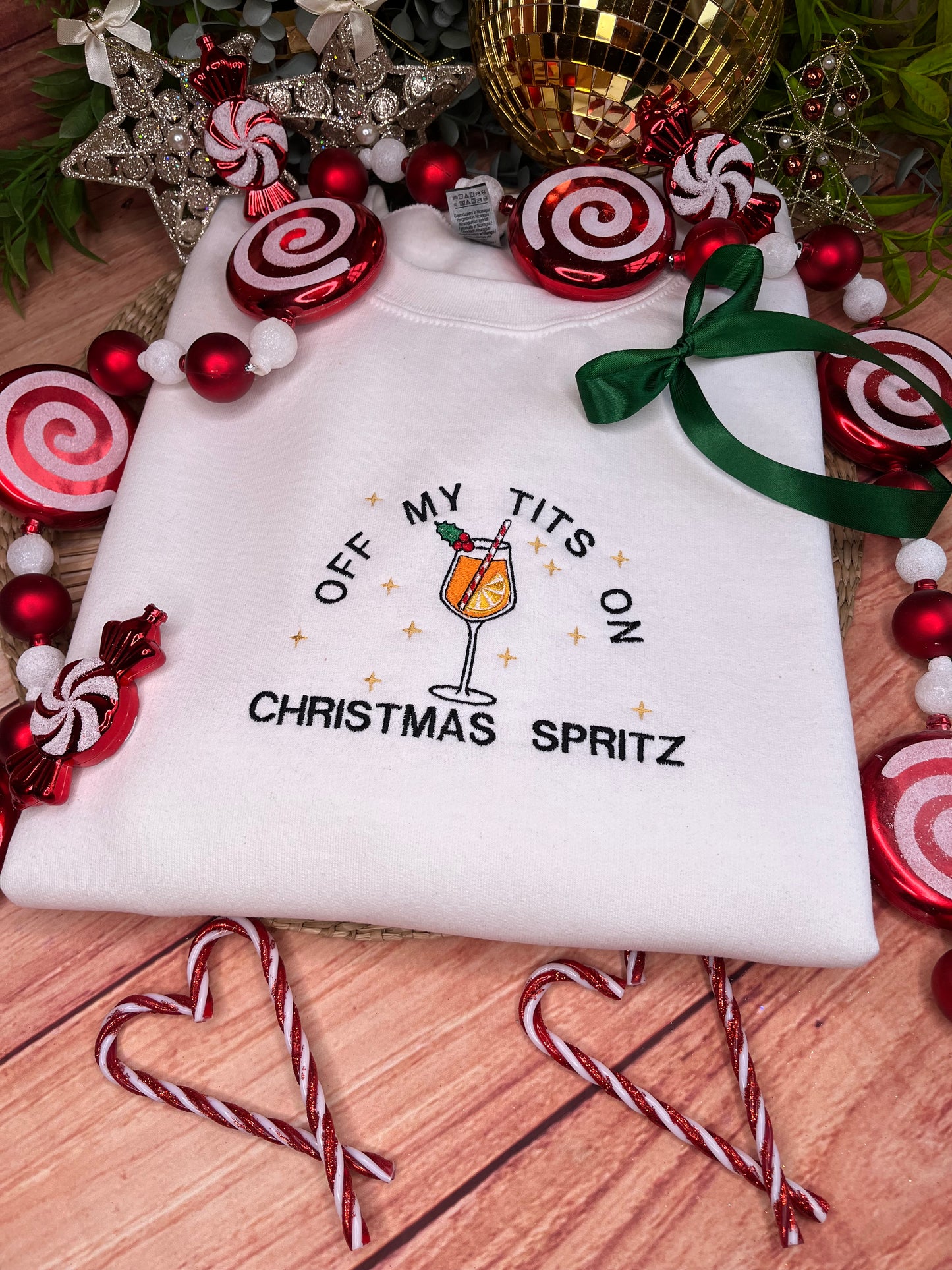 OFF MY TITS ON CHRISTMAS SPRITZ EMBROIDERED SWEATSHIRT