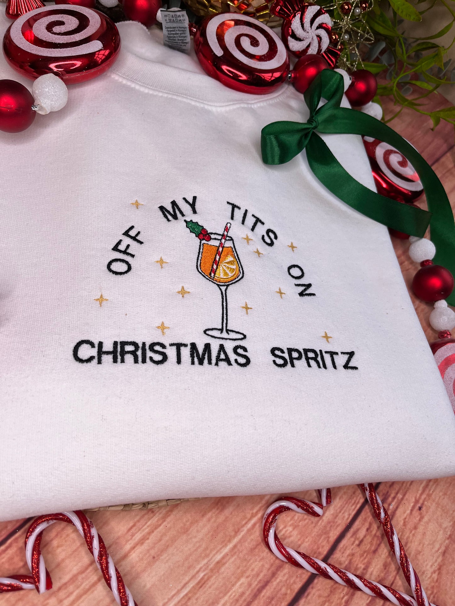 OFF MY TITS ON CHRISTMAS SPRITZ EMBROIDERED SWEATSHIRT