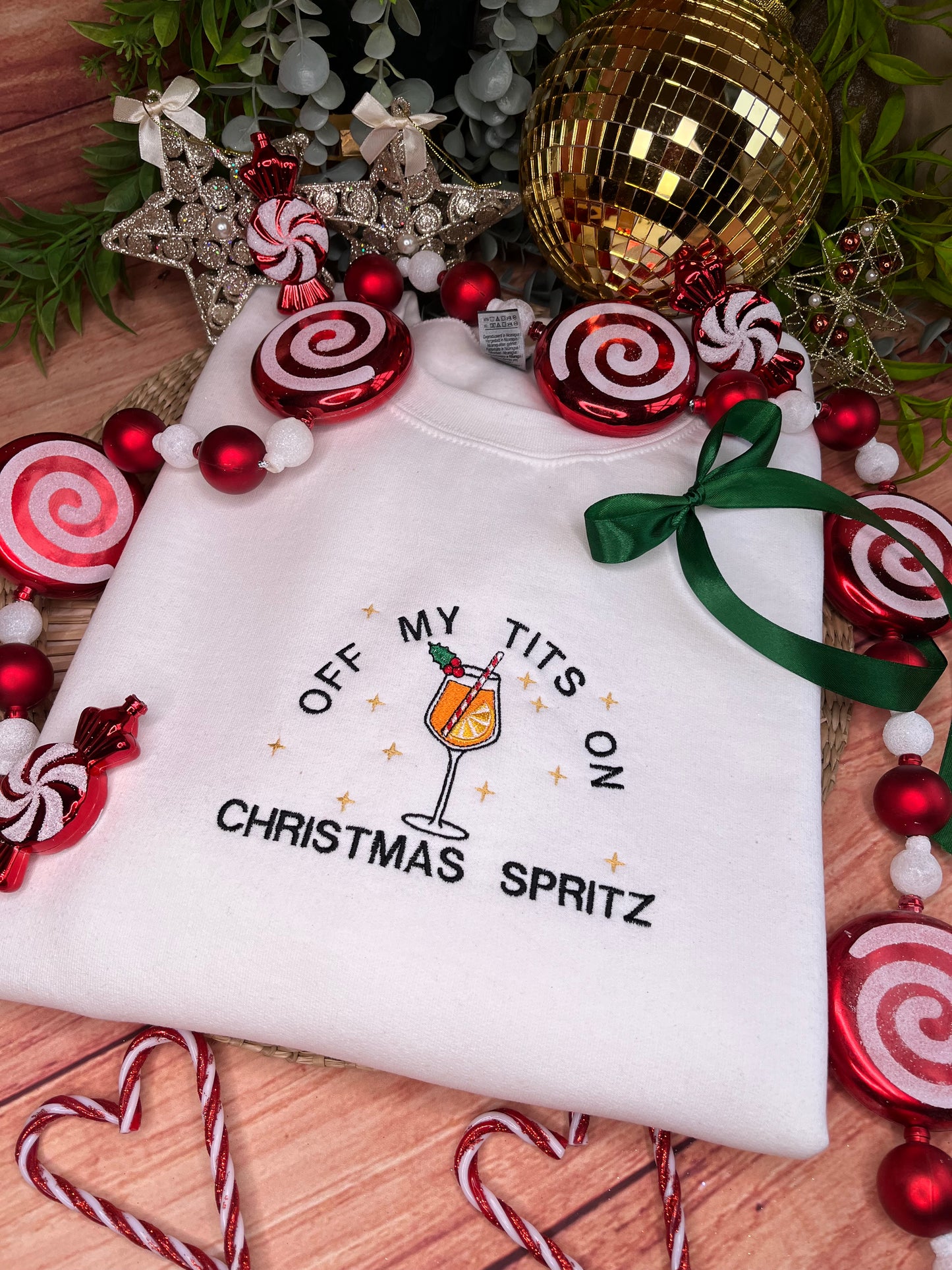 OFF MY TITS ON CHRISTMAS SPRITZ EMBROIDERED SWEATSHIRT