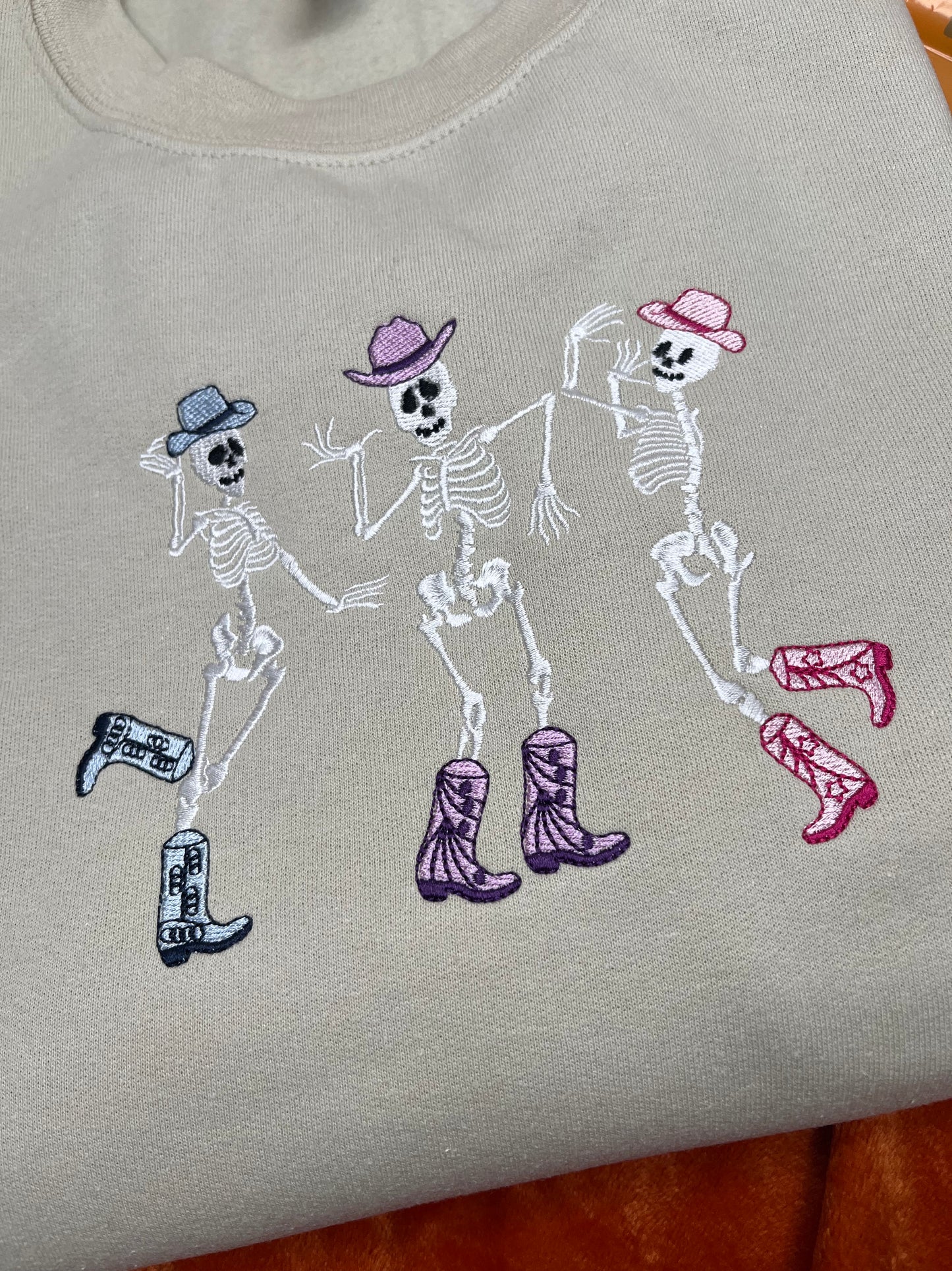 COLOURFUL DANCING SKELETONS EMBROIDERED SWEATSHIRT