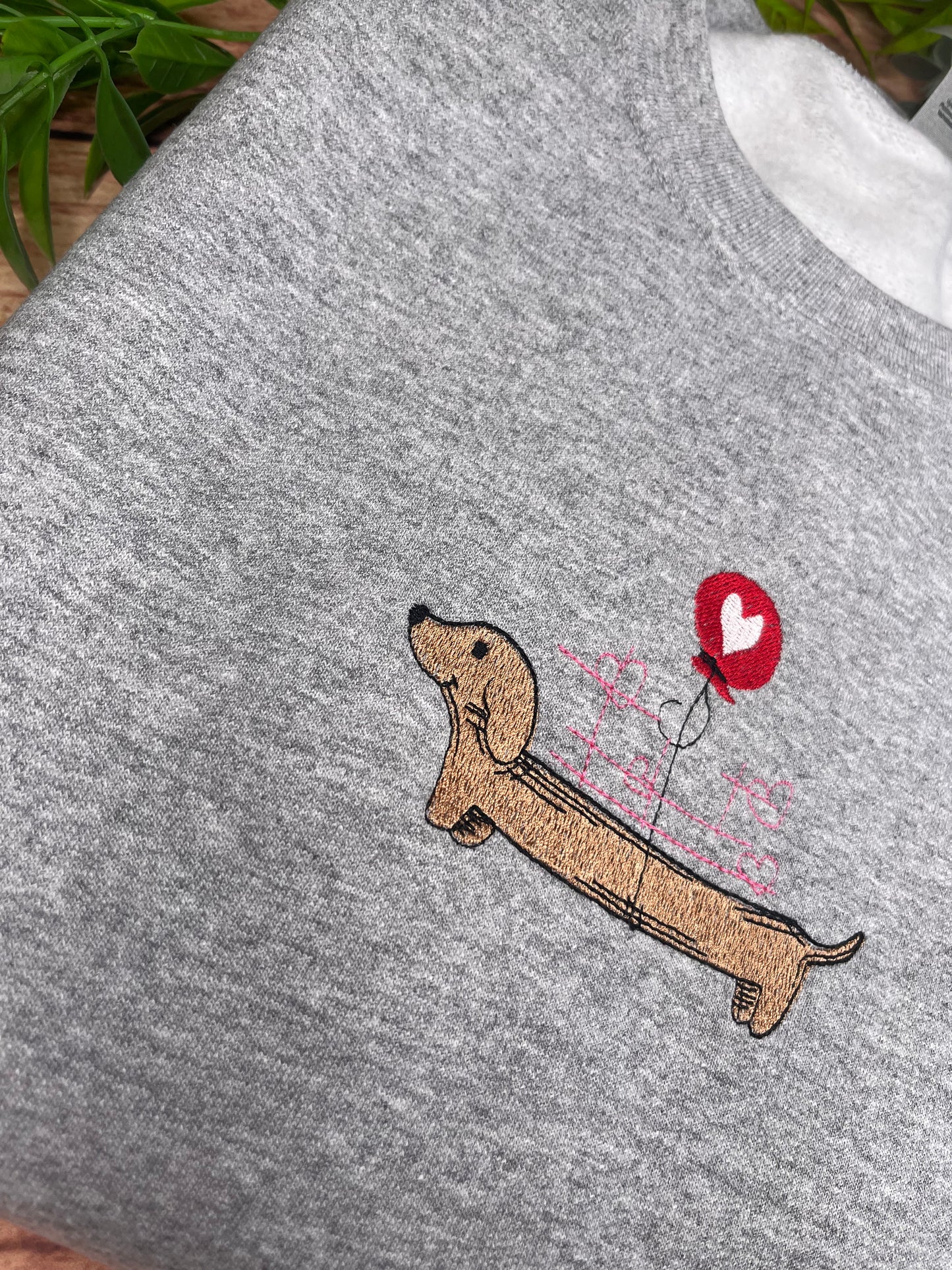 SAUSAGE DOG WITH BALLOON EMBROIDERED SWEATSHIRT LARGE