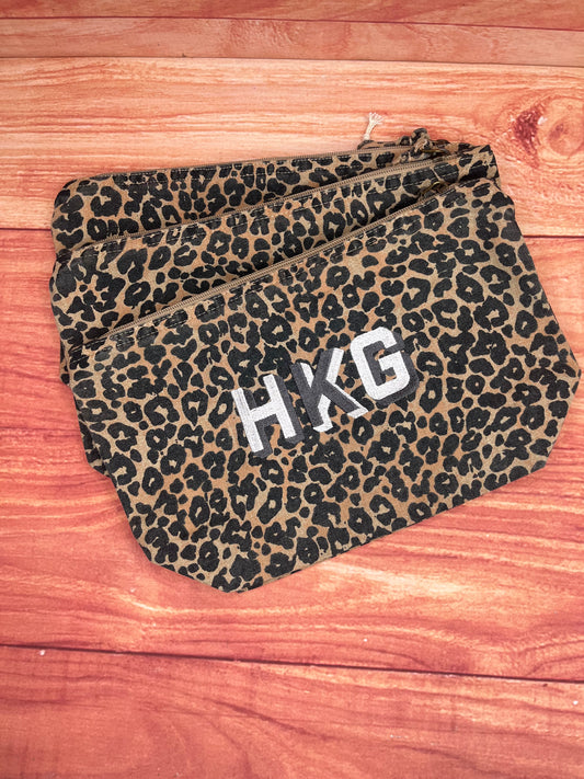 EMBROIDERED ANIMAL PRINT SHADOW FONT POUCH