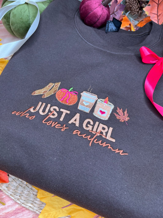JUST A GIRL WHO LOVES AUTUMN EMBROIDERED SWEATSHIRT