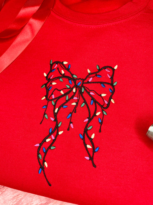 FESTIVE BOW WITH LIGHTS EMBROIDERED SWEATSHIRT