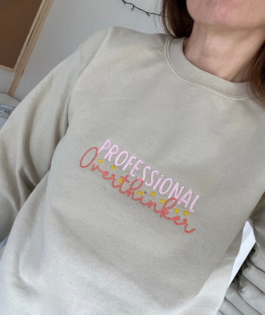 PROFESSIONAL OVERTHINKER SAND SWEATSHIRT SIZE SMALL