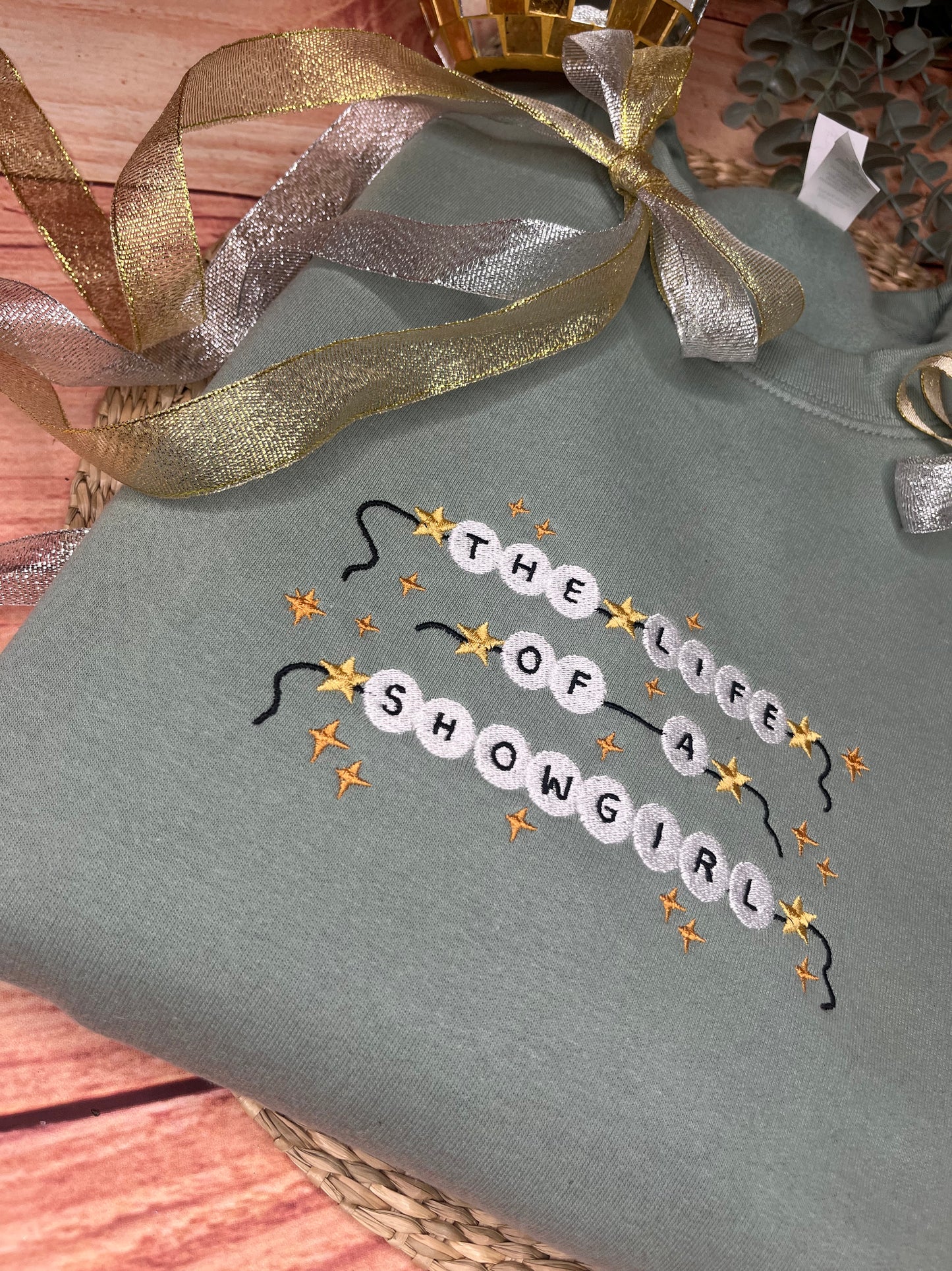 THE LIFE OF A SHOWGIRL EMBROIDERED SWEATSHIRT