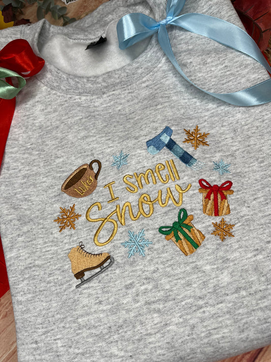 I SMELL SNOW PRESENTS EMBROIDERED SWEATSHIRT
